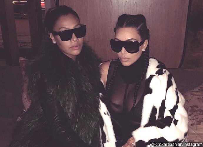 Kim Kardashian Flaunts Major Cleavage in Cruella DeVille-Inspired Outfit