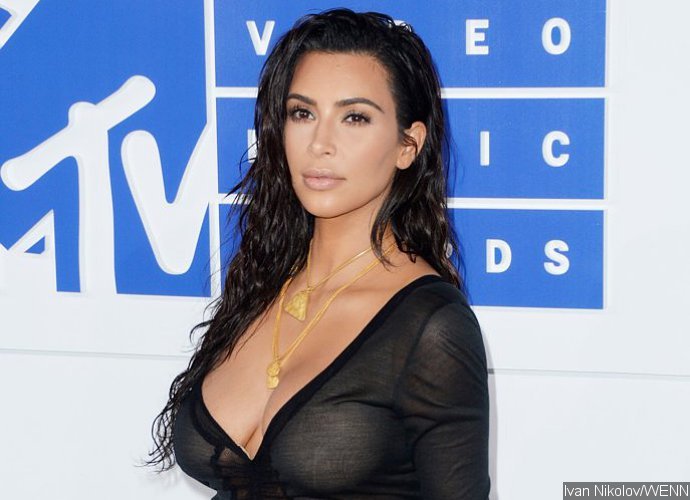Kim Kardashian Goes Completely Nude Again While Getting Midnight Spray Tan