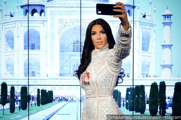 Kim Kardashian Immortalized With $230K Selfie-Taking Wax at Madame Tussauds