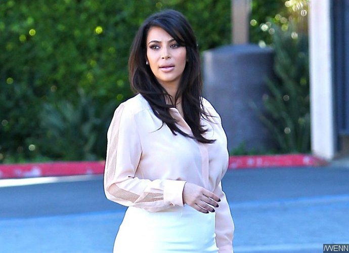 Kim Kardashian Laughs Off Third Pregnancy Rumors