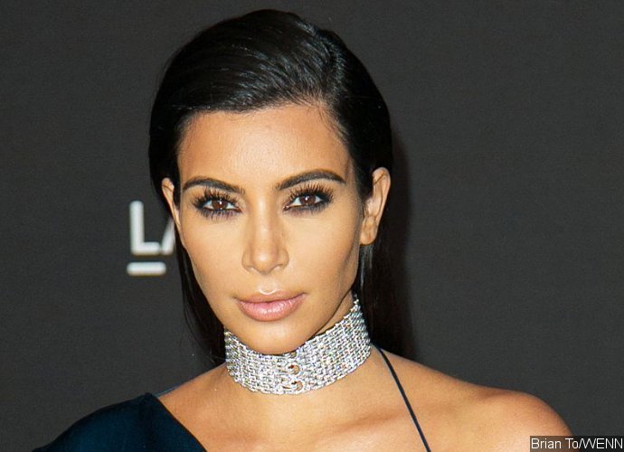 Kim Kardashian Nearly Spills Out of This Revealing Lacy Lingerie