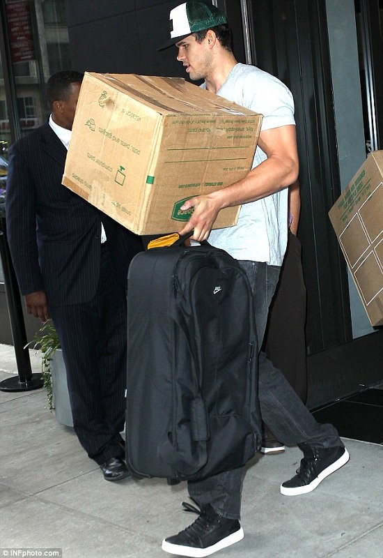 Kim Kardashian's Husband Seen Carrying Boxes Out of Hotel Without Wedding 