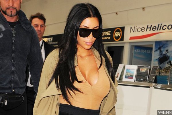 Kim Kardashian Takes a 'Fun Video' of Drunk Naked Woman Trying to Enter Her Hotel Room