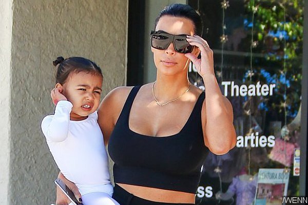 Kim Kardashian Teaching Daughter North West the Art of Selfie