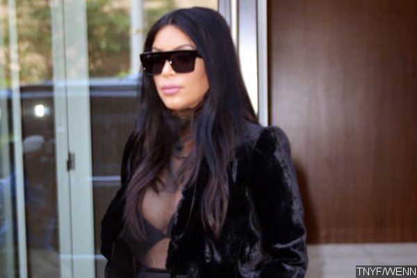 Kim Kardashian Wears Fuzzy Slippers to Alleviate Her Swollen Ankles