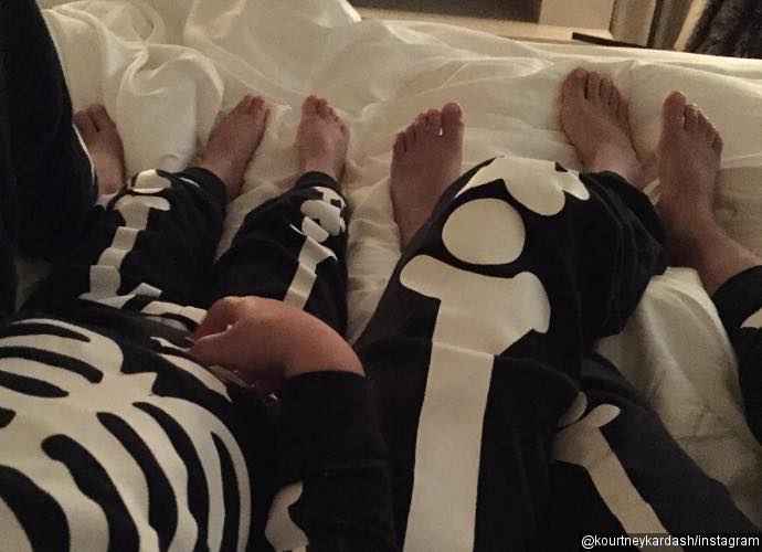 Kourtney Kardashian and Kids Dress in Matching Skeleton Pajamas