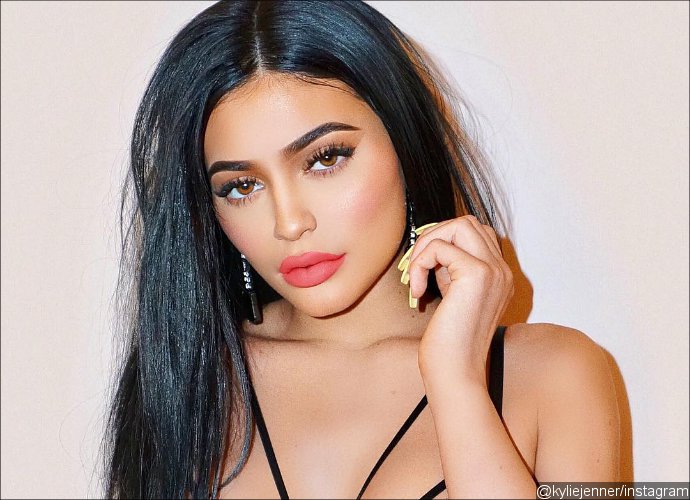 Kylie Jenner Flaunts Ample Cleavage in Sheer Lace Lingerie in New Sultry Pic