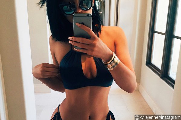 Kylie Jenner Flaunts Cleavage and Big Booty in Bikini Pics