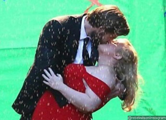 Liam Hemsworth and Rebel Wilson Share a Steamy Kiss on Set of 'Isn't It Romantic'