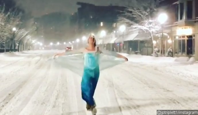 Man Dressed as Elsa Rescues Cop Wagon Stuck in the Snow