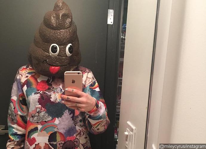 Miley Cyrus Covers Her Face With 'Feces'
