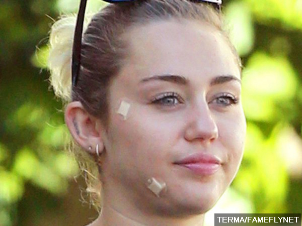 Miley Cyrus Spotted With Bandages on Her Face After Leaving Doctor's Office