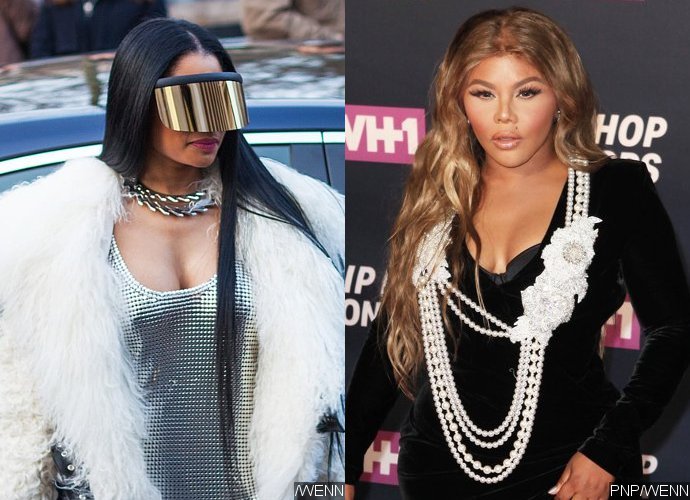 Nicki Minaj Denies Lil' Kim Was Inspiration for Her Racy Look at Paris Fashion Week