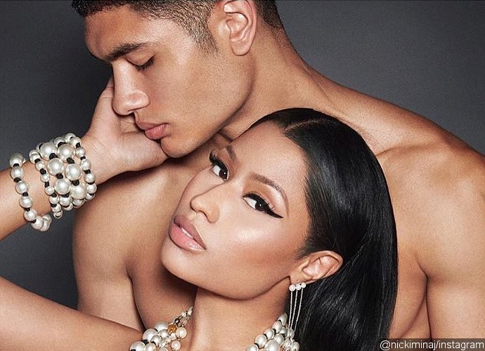 Nicki Minaj Strips Naked in Provocative Photo Shoot With Nude Male Models