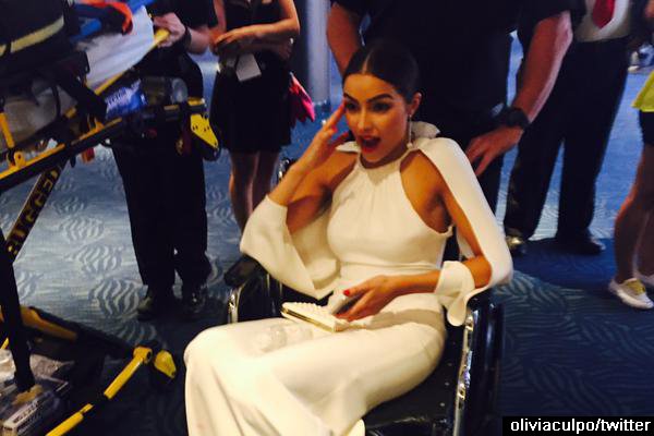 Olivia Culpo Nearly Faints From 100-Degree Heat During Emmys Red Carpet
