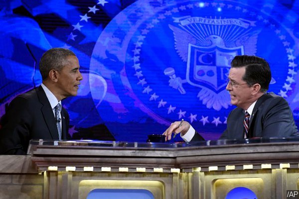 President Obama Takes Over Stephen Colbert's Seat on 'The Colbert Report'