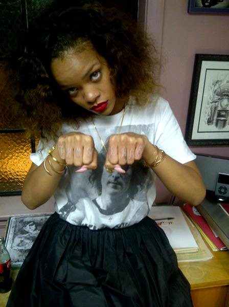 Rihanna Pays Homage to Tupac With Pink Thug Life Tattoo See larger image