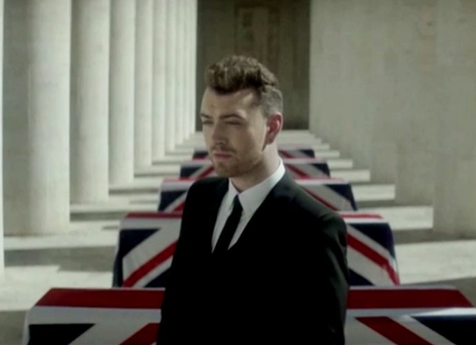 Sam Smith Walks Among Coffins in 'Writing's on the Wall' Music Video Preview