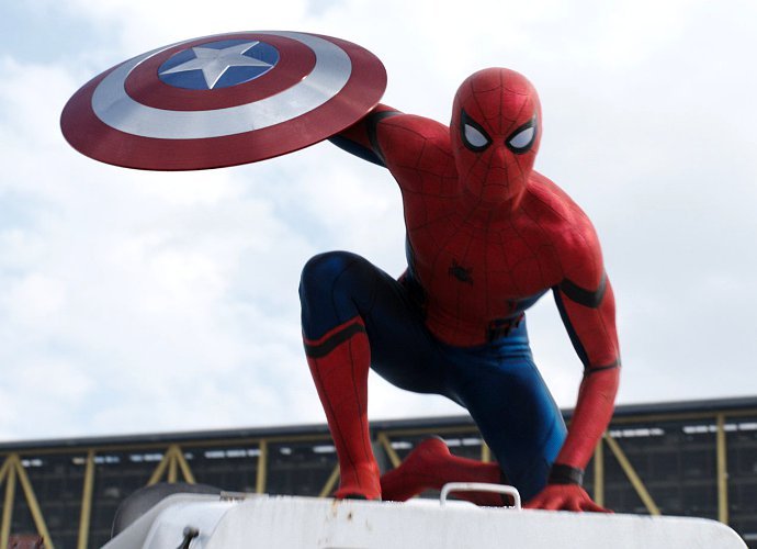 Spidey Saves Mysterious Redhead in New 'Spider-Man: Homecoming' Set Pics. Is She Mary Jane?