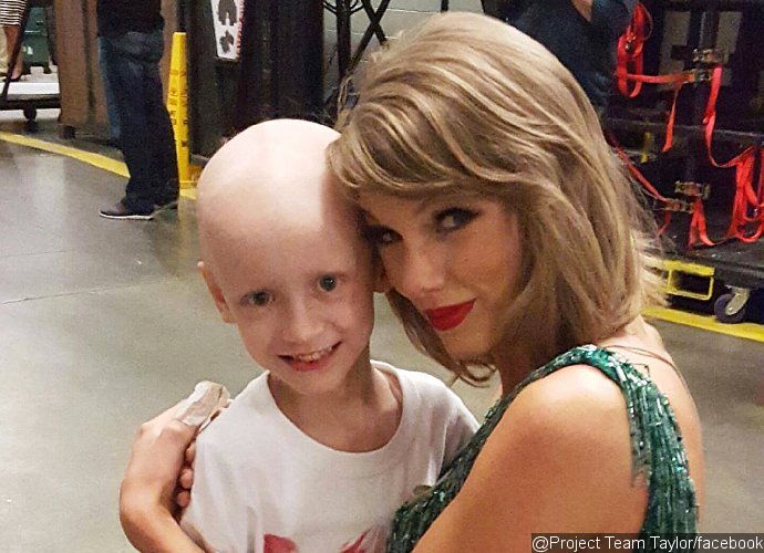 Taylor Swift Cuddles 6-Year-old Fan With Rare Cancer