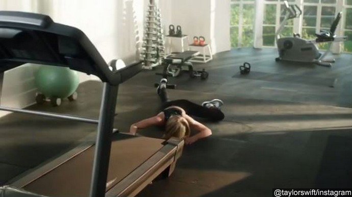 Ouch! Taylor Swift Faceplants on Treadmill While Rapping in New Apple Music Ad