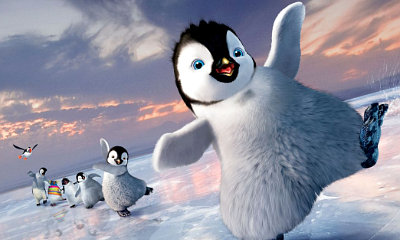 Mumble has a tiny little son who is afraid to dance in 'Happy Feet Two'