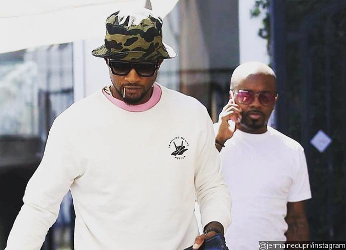 Usher Is All Smiles as He Steps Out for Coffee Amid STD Scandal