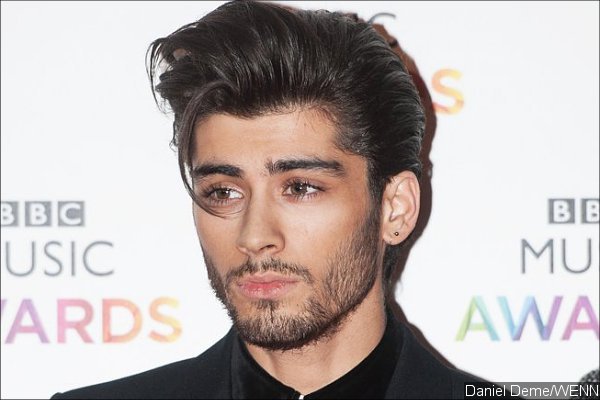Zayn Malik Leaves Stage Early After Falling Ill During One Direction's Concert