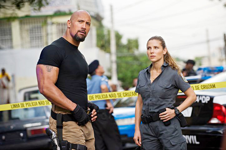 The Rock stars as Hobbs and Elsa Pataky stars as Elena Neves in Universal Pictures' Fast Five (2011)