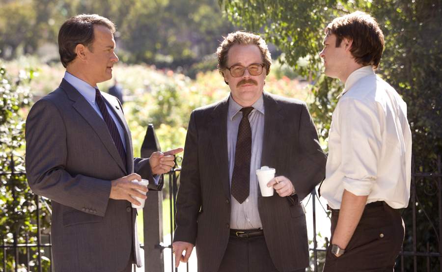 Tom Hanks, Philip Seymour Hoffman and Christopher Denham in Universal Pictures' Charlie Wilson's War (2007)