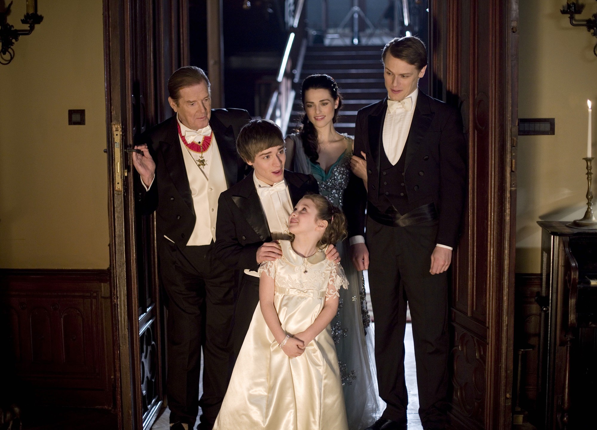 Roger Moore, Travis Turner, Leilah de Meza, Katie McGrath and Sam Heughan in Hallmark Channel's A Princess for Christmas (2011)