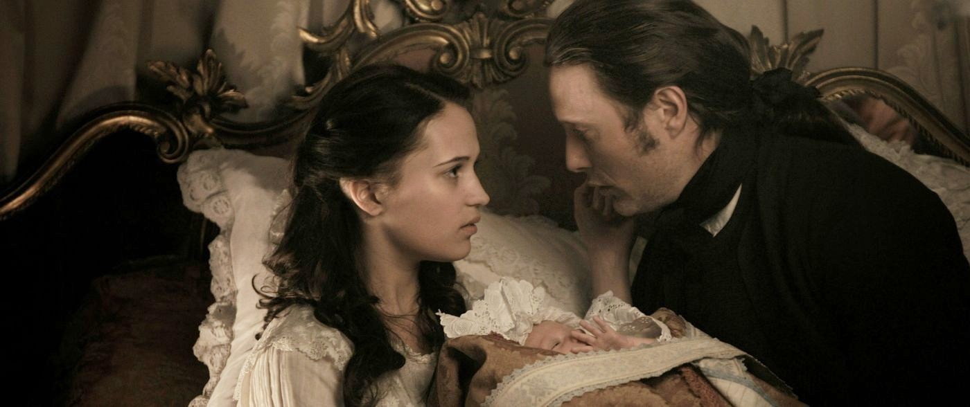 Alicia Vikander stars as Caroline Mathilde and Mads Mikkelsen stars as Johann Friedrich Struensee in Magnolia Pictures' A Royal Affair (2012)