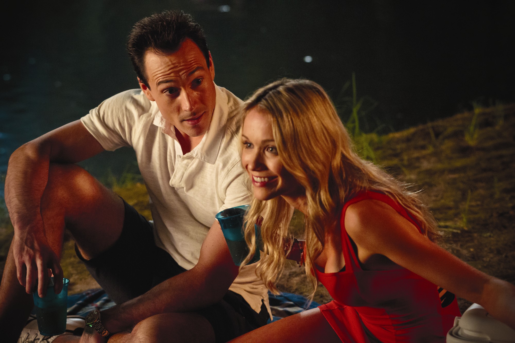 Chris Klein stars as Oz and Katrina Bowden stars as Mia in Universal Pictures' American Reunion (2012)