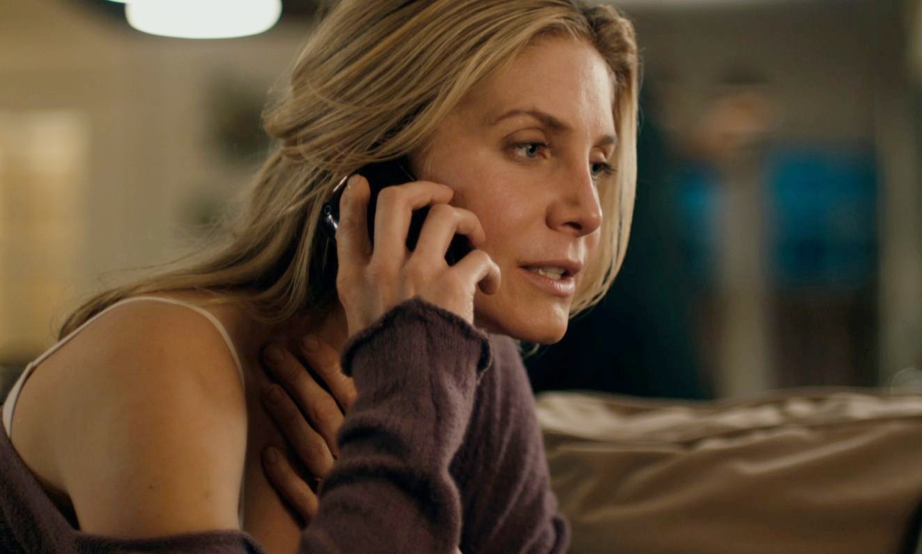 Elizabeth Mitchell stars as Kate in Roadside Attractions' Answers to Nothing (2011)