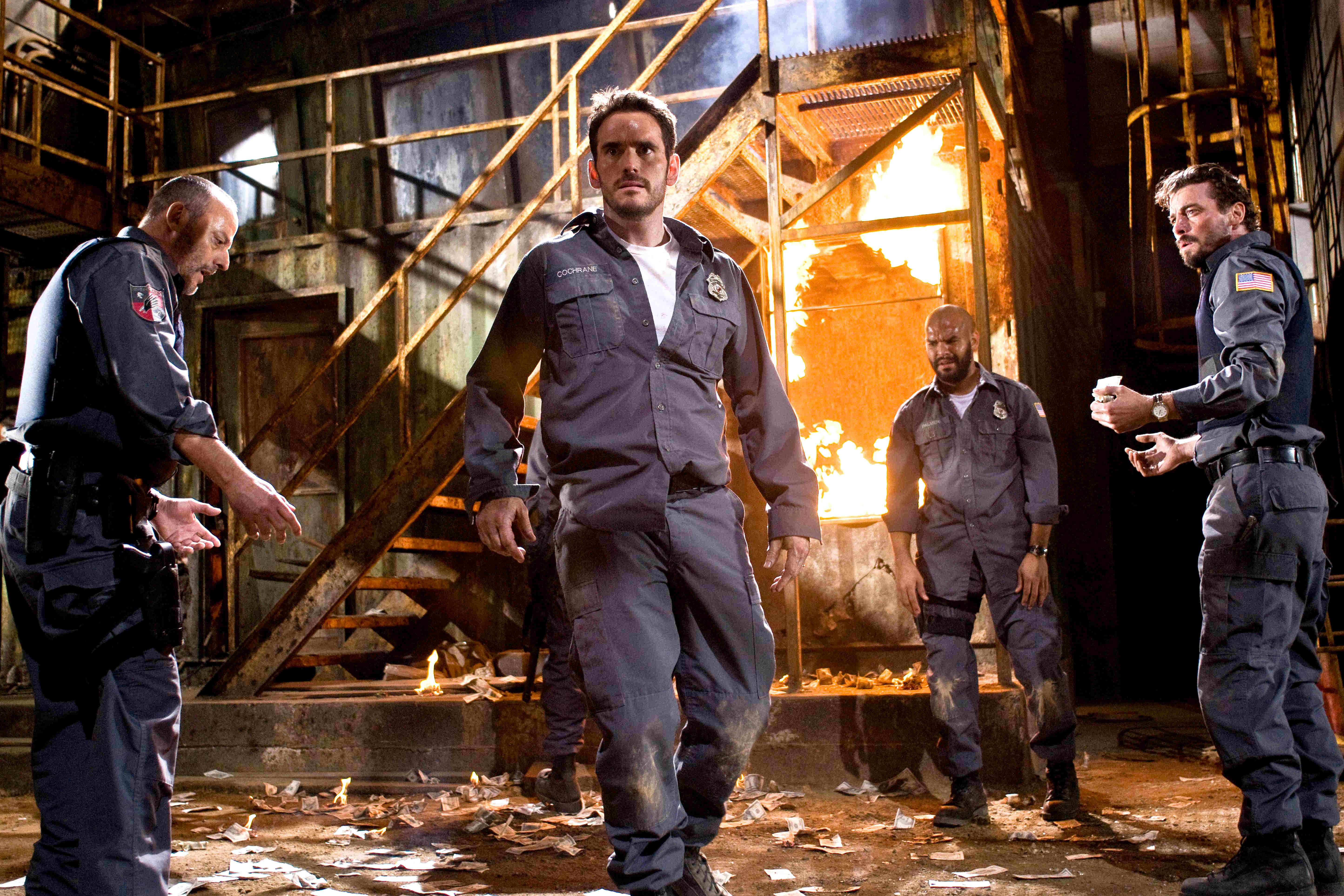 Jean Reno, Matt Dillon, Amaury Nolasco and Skeet Ulrich in Screen Gems' Armored (2009). Photo credit by Lacey Terrell.
