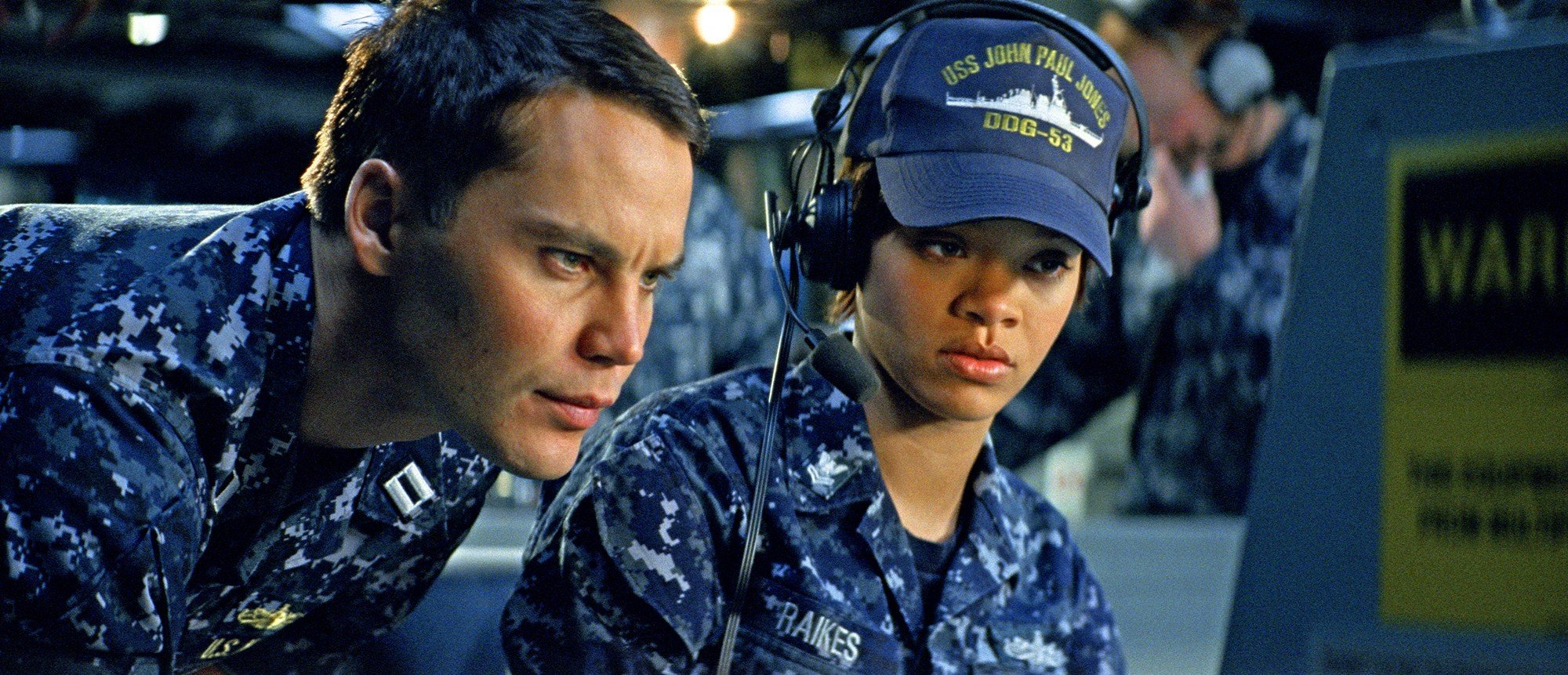 Taylor Kitsch stars as Alex Hopper and Rihanna stars as Raikes in Universal Pictures' Battleship (2012)