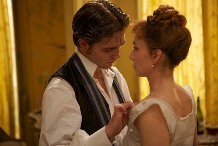 Robert Pattinson stars as Georges Duroy and Kristin Scott Thomas stars as Virginie Walters in Magnolia Pictures' Bel Ami (2012)