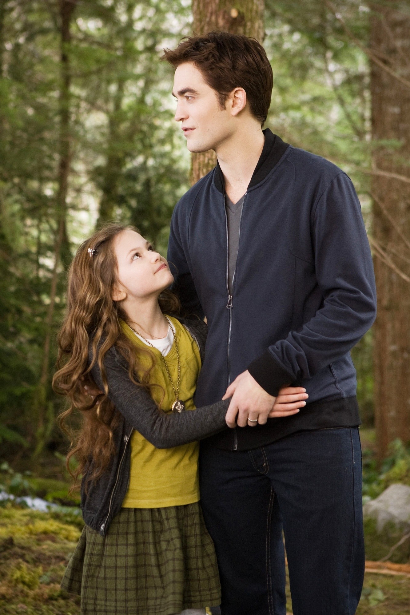 Mackenzie Foy stars as Renesmee and Robert Pattinson stars as Edward Cullen in Summit Entertainment's The Twilight Saga's Breaking Dawn Part II (2012)