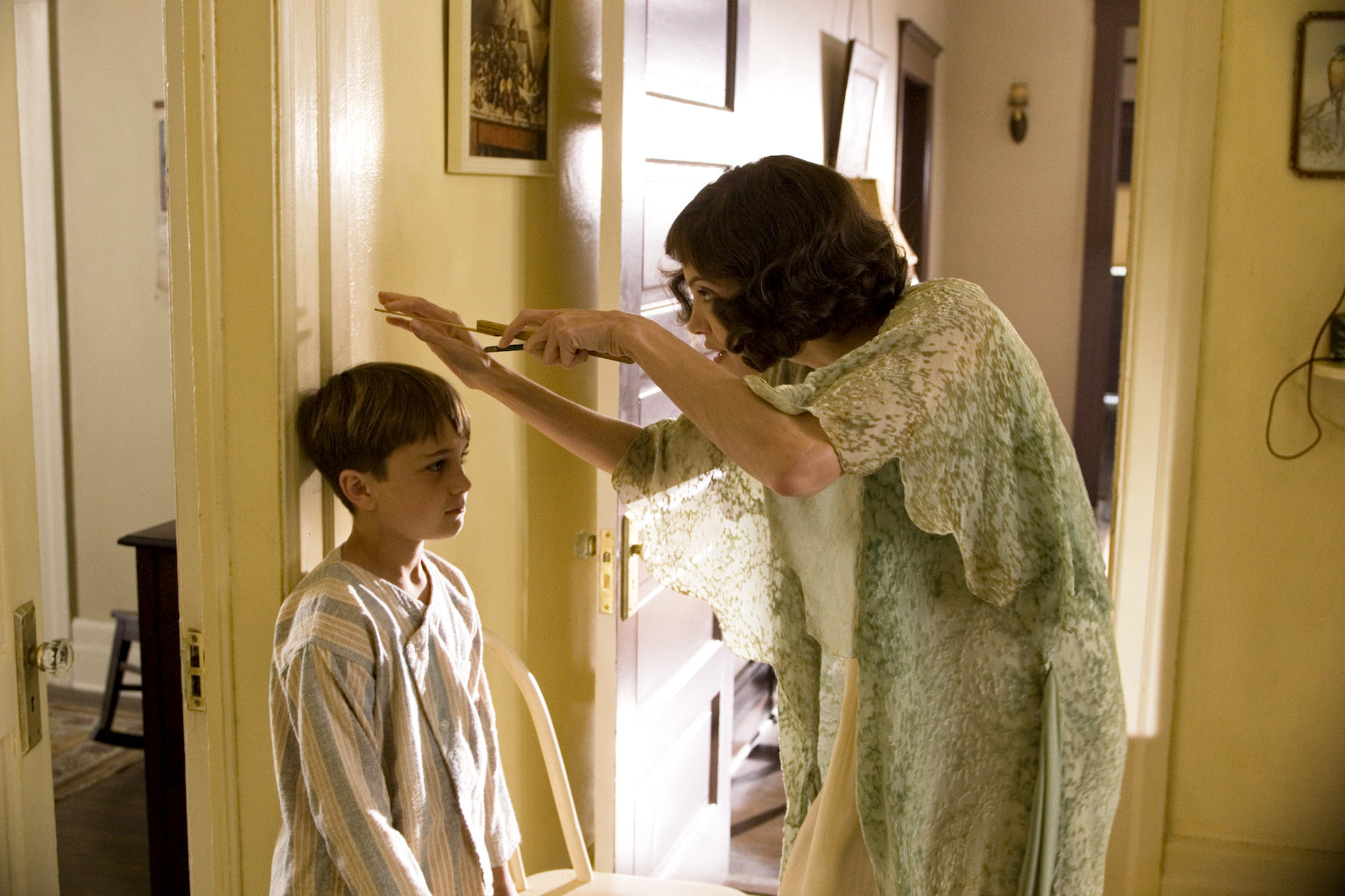 Gattlin Griffith stars as Walter Collins and Angelina Jolie stars as Christine Collins in Universal Pictures' Changeling (2008)