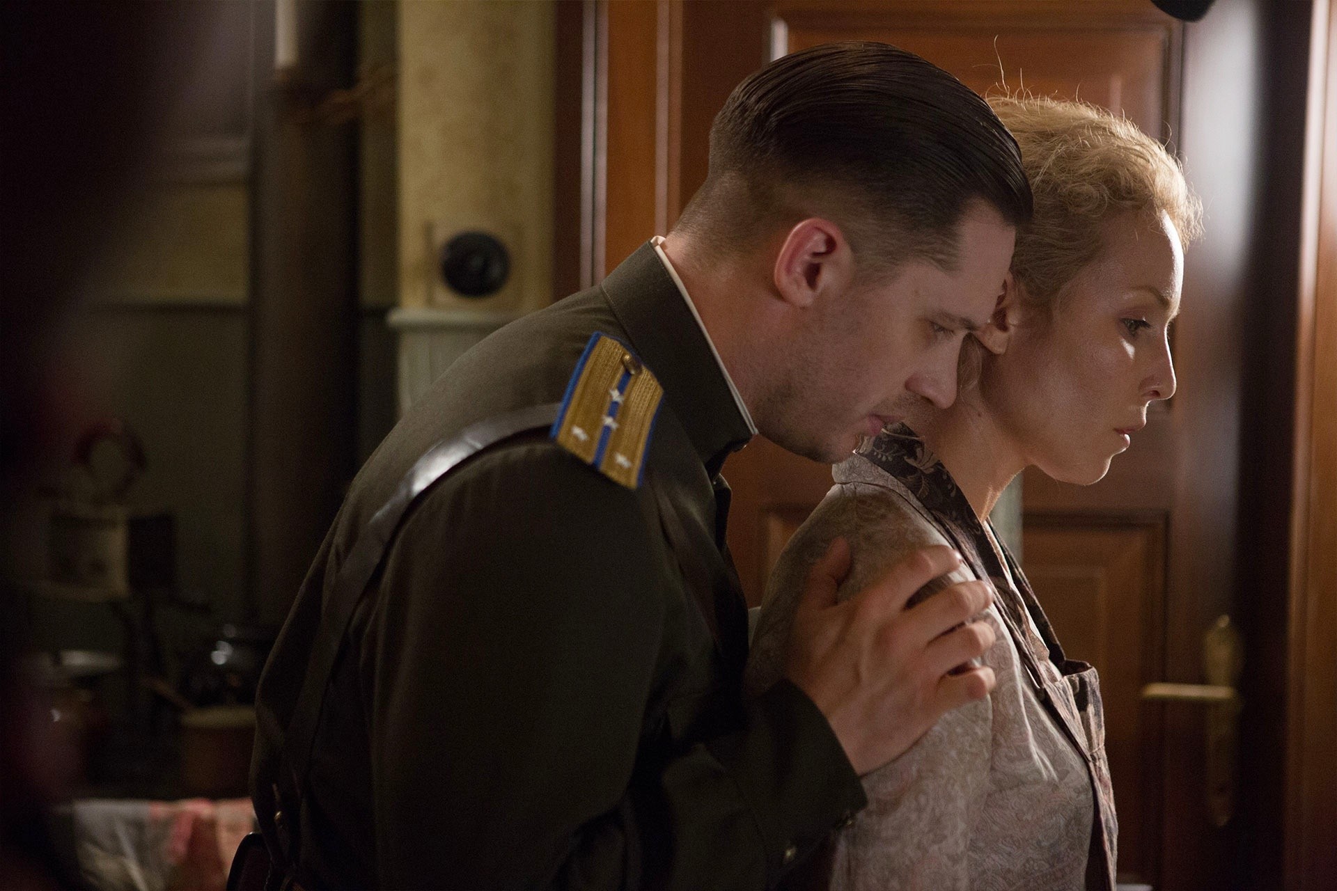 Tom Hardy stars as Leo Demidov and Noomi Rapace stars as Raisa Demidov in Summit Entertainment's Child 44 (2015). Photo credit by Larry Horricks.