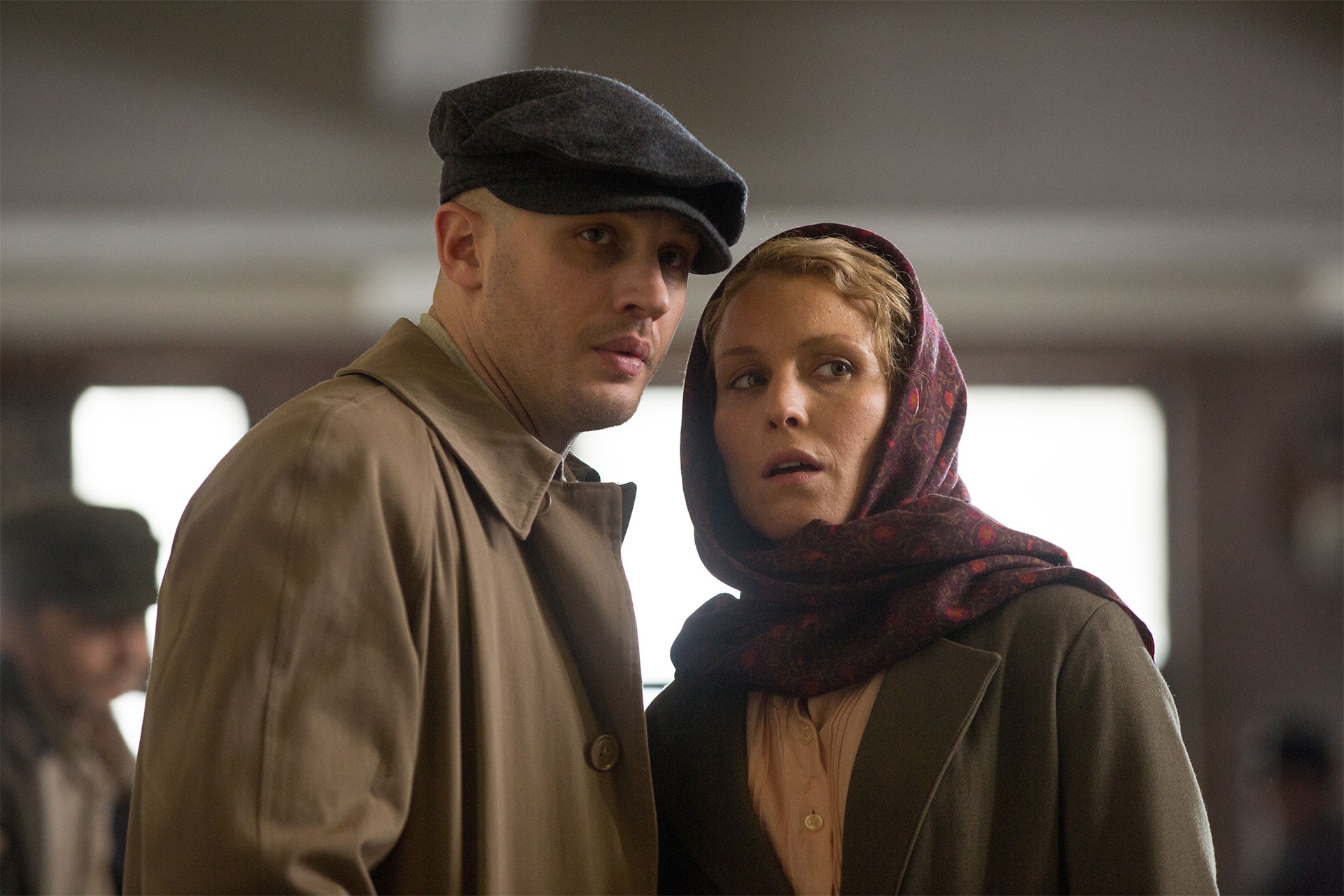 Tom Hardy stars as Leo Demidov and Noomi Rapace stars as Raisa Demidov in Summit Entertainment's Child 44 (2015). Photo credit by Larry Horricks.