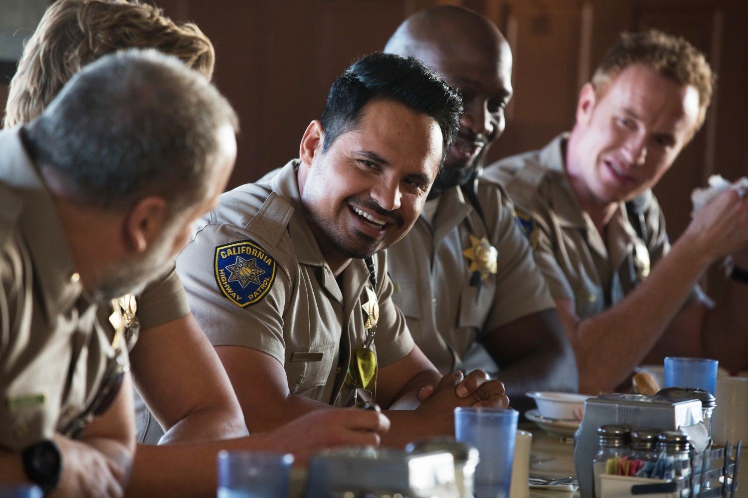 Michael Pena stars as Frank 'Ponch' Poncherello and Ryan Hansen stars as Brian Grieves in Warner Bros. Pictures' CHiPs (2017)