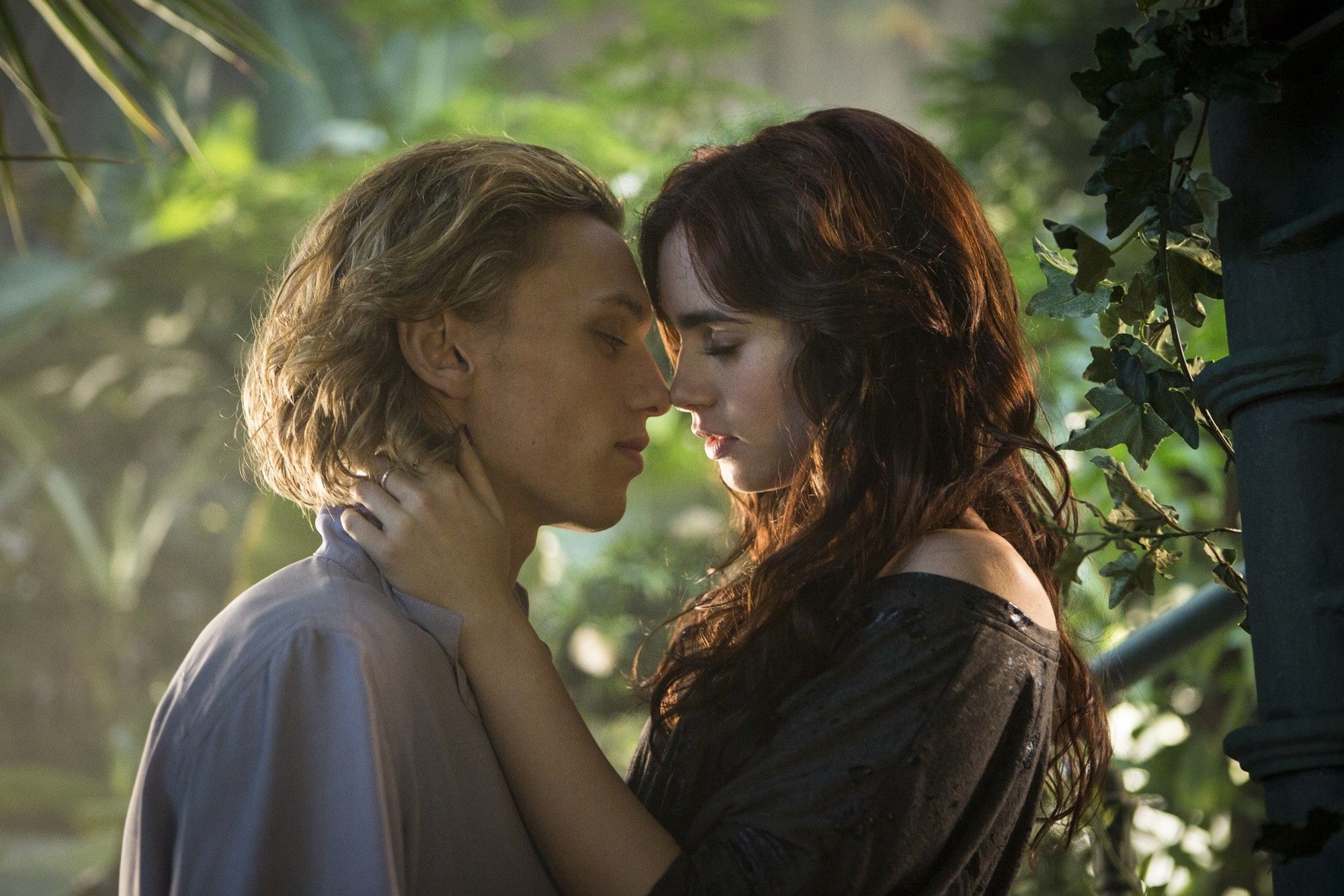 Jamie Campbell Bower stars as Jace Wayland and Lily Collins stars as Clary Fray in Screen Gems' The Mortal Instruments: City of Bones (2013)