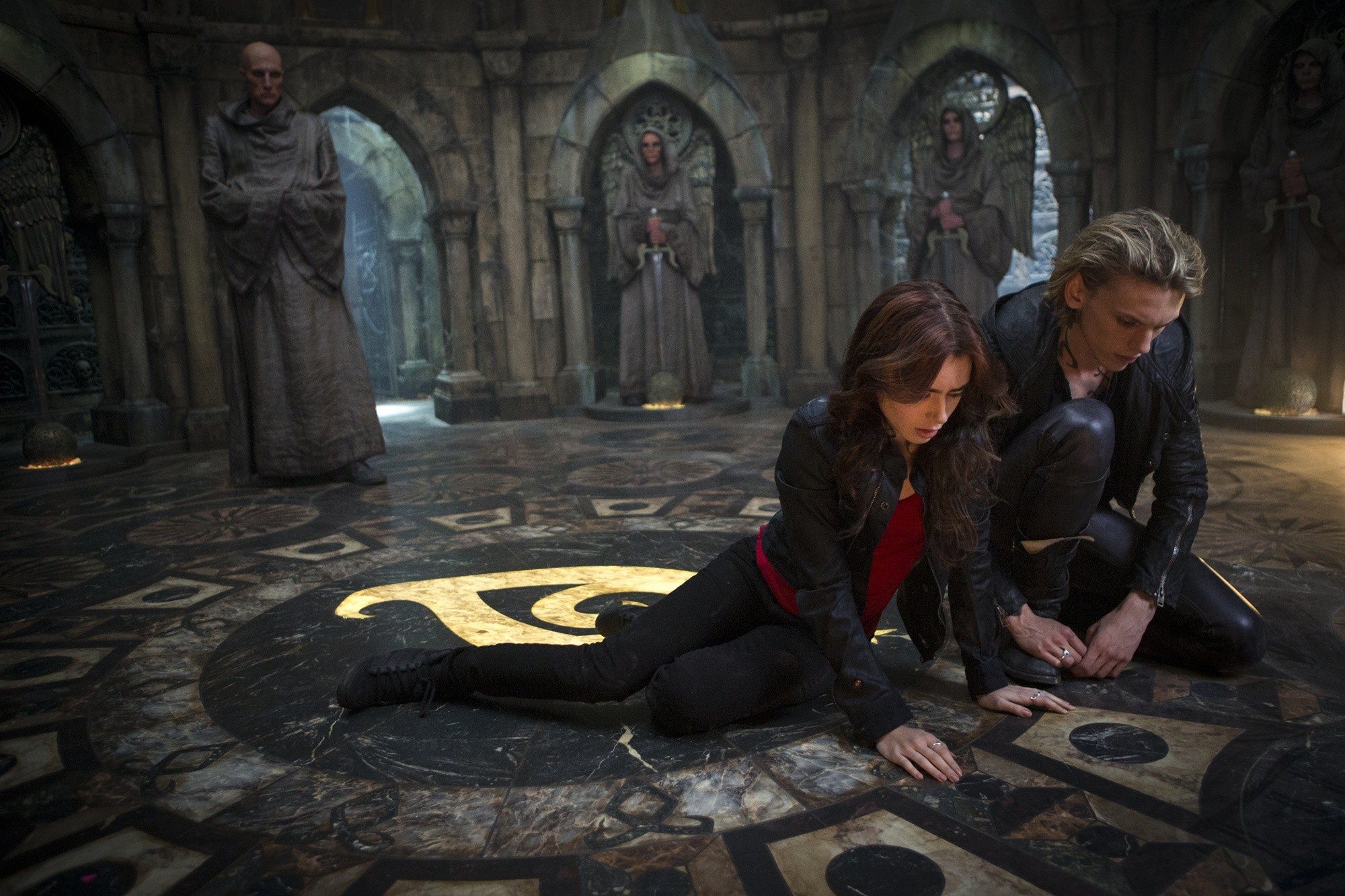 Lily Collins stars as Clary Fray and Jamie Campbell Bower stars as Jace Wayland in Screen Gems' The Mortal Instruments: City of Bones (2013). Photo credit by Rafy.
