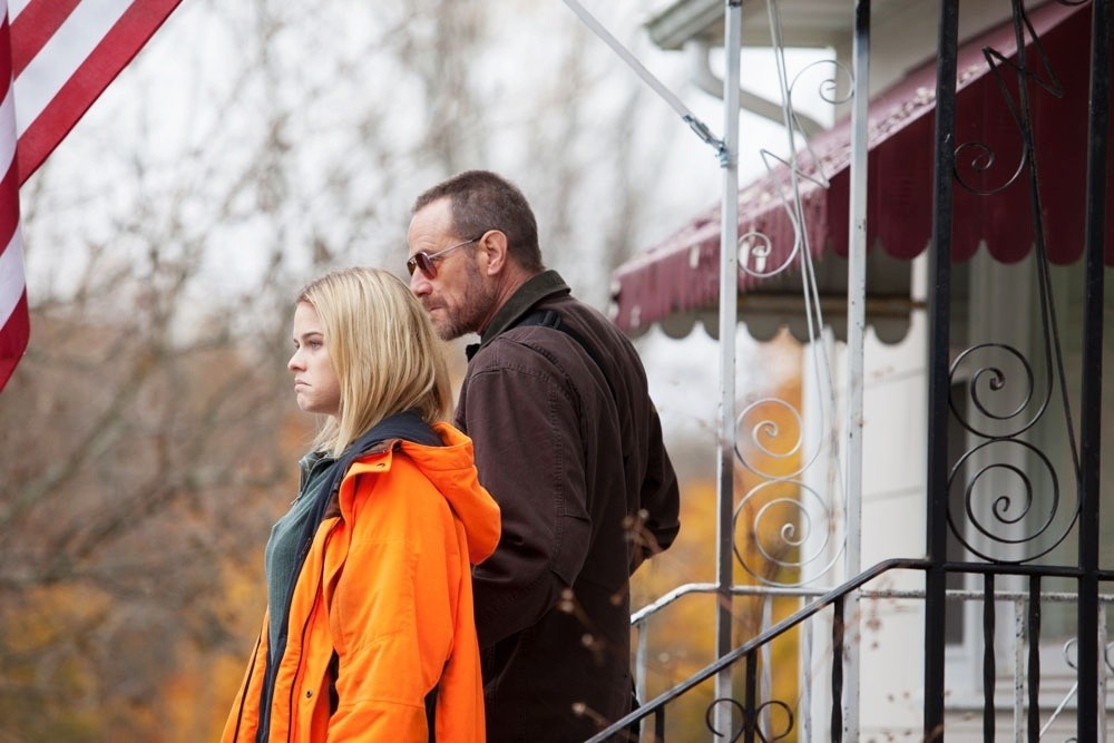 Alice Eve stars as Chloe and Bryan Cranston stars as Topo in Samuel Goldwyn Films' Cold Comes the Night (2014)