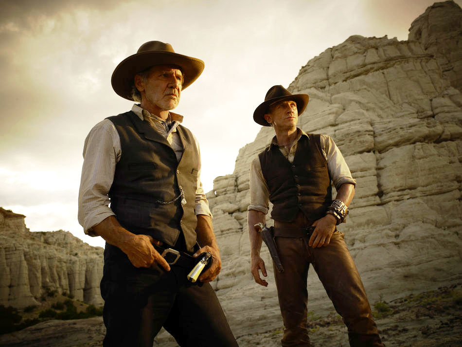 Daniel Craig stars as Jake Lonergan and Harrison Ford stars as Col. Woodrow Dolarhyde in DreamWorks Pictures' Cowboys and Aliens (2011)