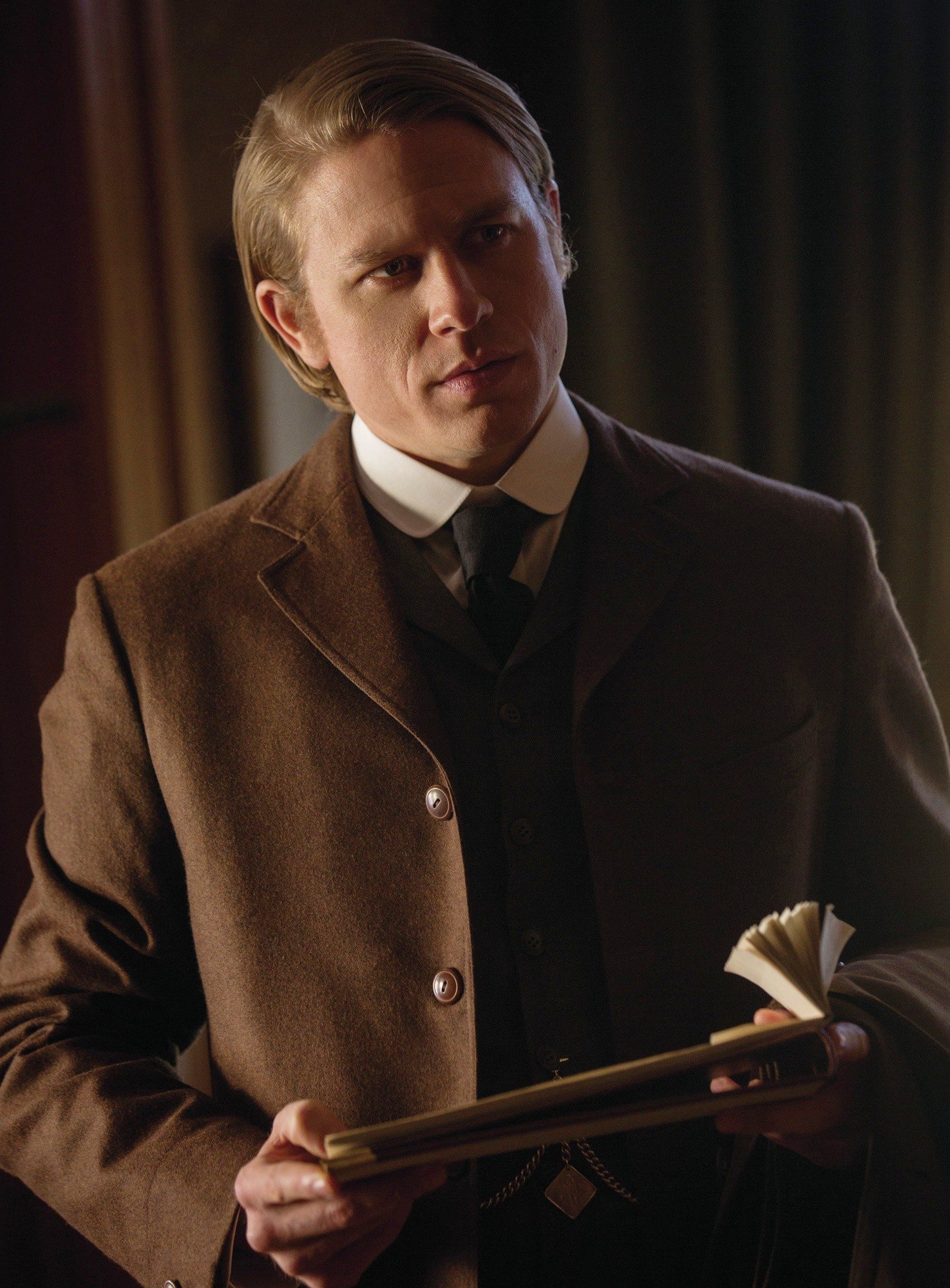 Charlie Hunnam stars as Dr. Alan McMichael in Universal Pictures' Crimson Peak (2015)