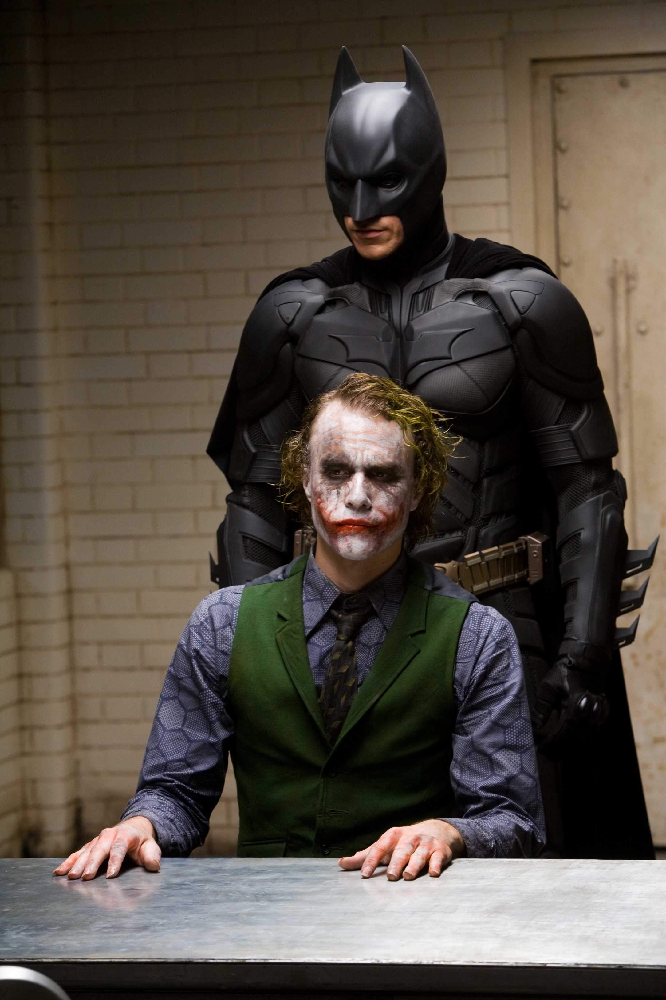 CHRISTIAN BALE stars as Bruce Wayne and HEATH LEDGER as Joker in Warner Bros. Pictures' and Legendary Pictures' action drama 