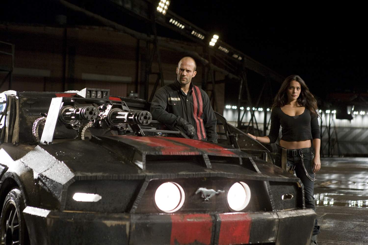 JASON STATHAM and NATALIE MARTINEZ in an action-thriller set in the post-industrial wasteland of tomorrow, with the world's most brutal sporting event as its backdrop - Death Race. Photo Credit: Takashi Seida.