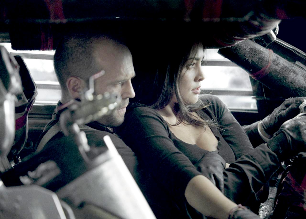 Jason Statham stars as Jensen Ames and Natalie Martinez stars as Case in Universal Pictures' Death Race (2008)